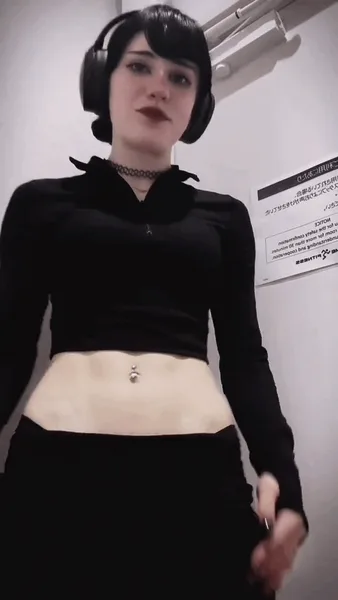 Goth girl revealing her abs
